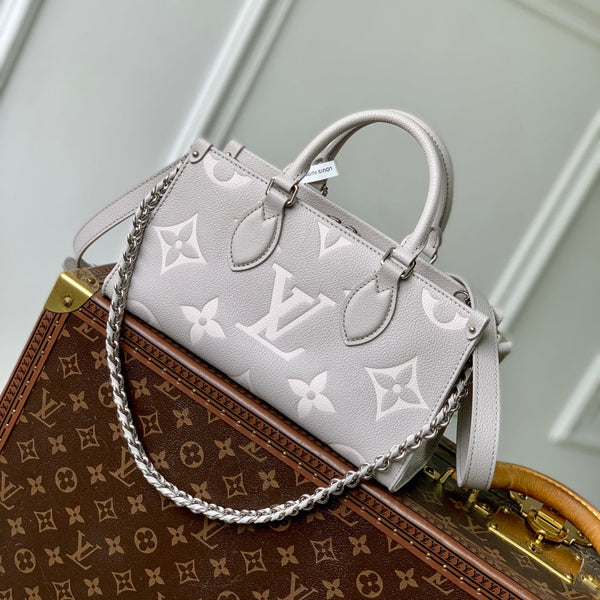 ONTHEGO EAST WEST BAG 25 IN BICOLOR MONOGRAM EMPREINTE LEATHER