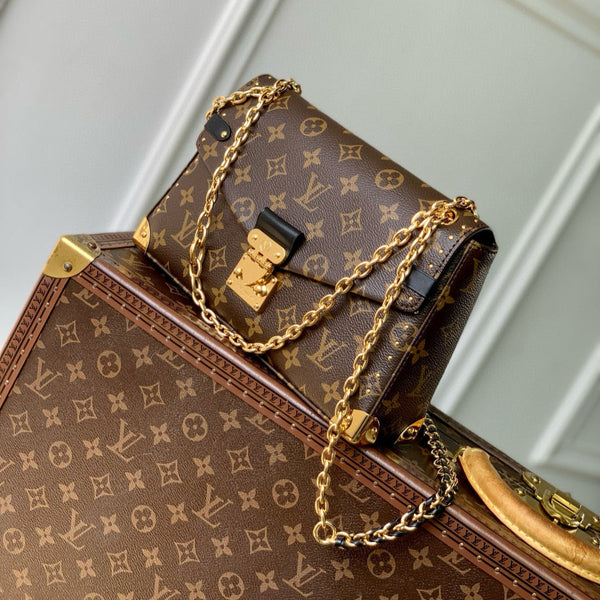 TRUNKIE 27 IN BROWN COATED CANVAS BLACK CALFSKIN SIGNATURE S-LOCK